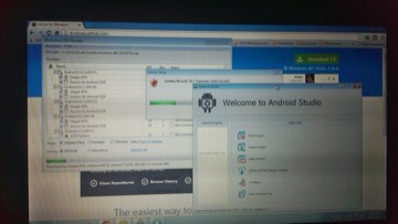 A laptop screen with Android Studio, the SDK manager, GitHub, Photoshop, and XDA tabs open.