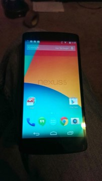 A Nexus 5 on the KitKat home screen.