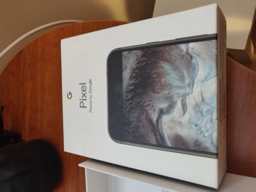 A Google Pixel phone in its retail box.