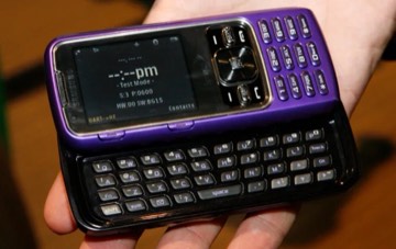 A purple Samsung Rant 2008 slider phone with its keyboard slid out.